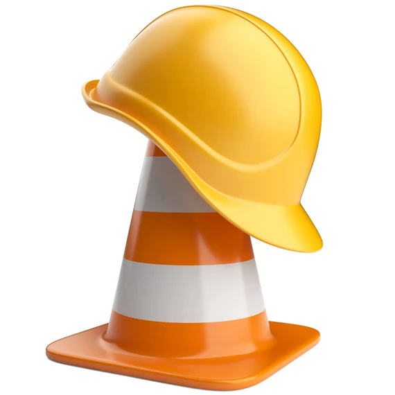 Bauhelm und Baustellenkegel